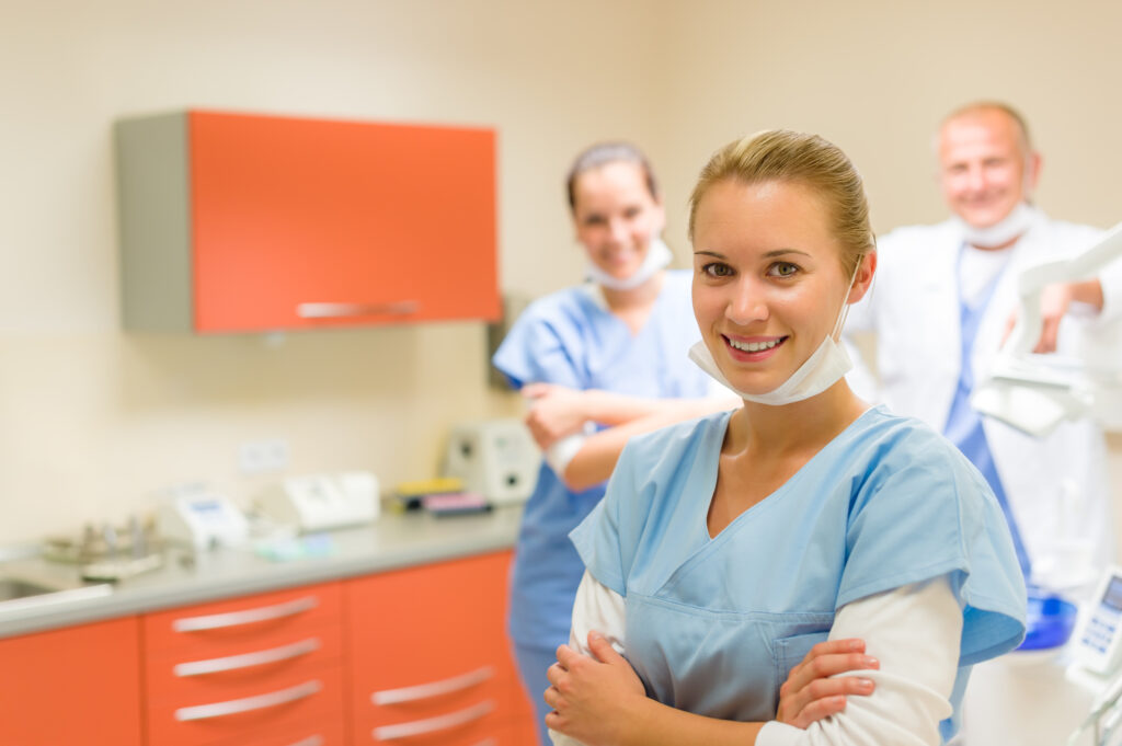 dental team smiling in office