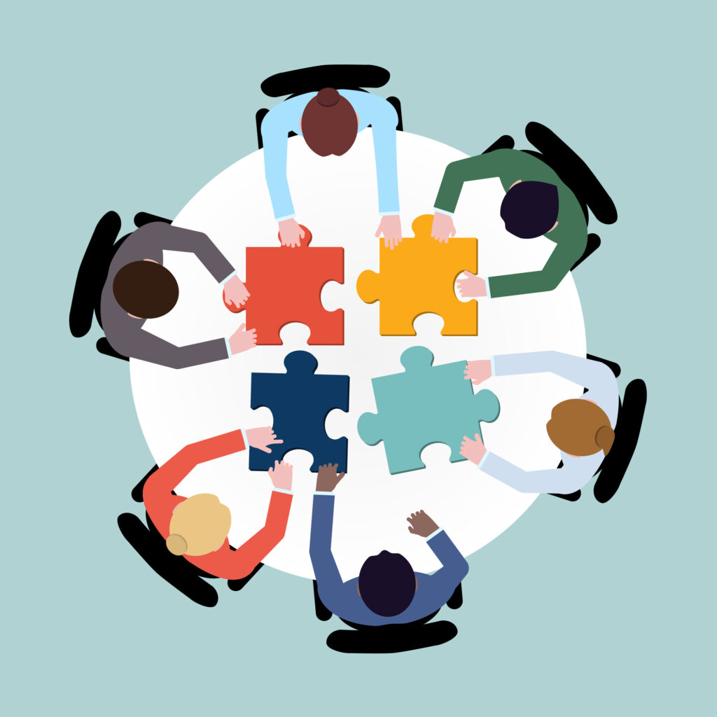 team meeting with puzzle pieces